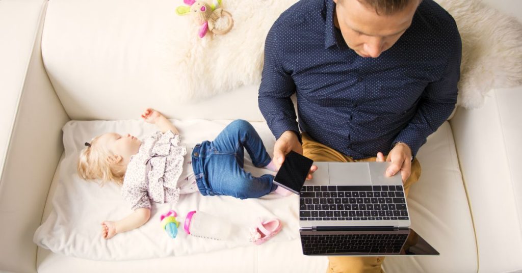 Dad working instead of taking care of his daughter