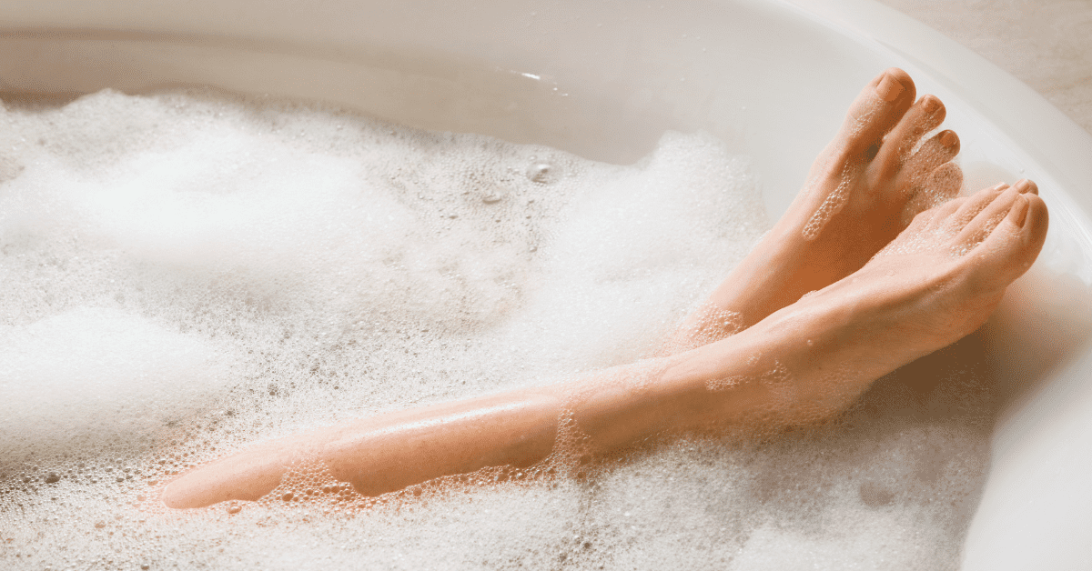 Mom in a bath taking time for herself