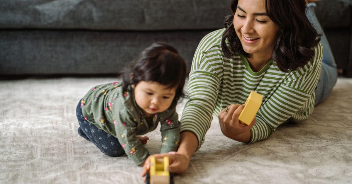 Mom playing with daughter